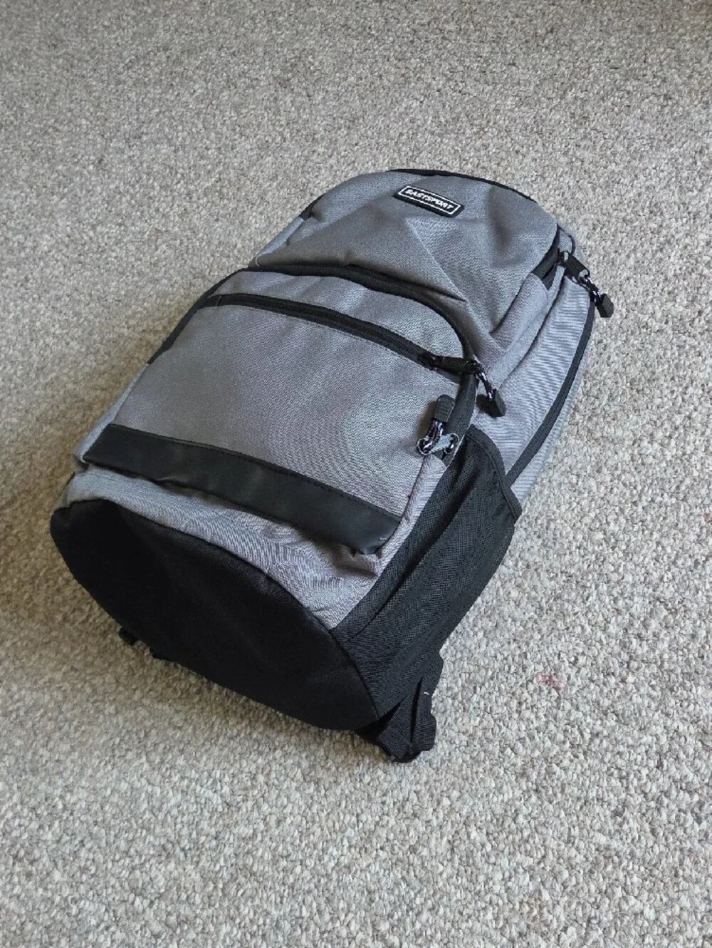NWOT Eastsport Gray Backpack with Multiple Pockets